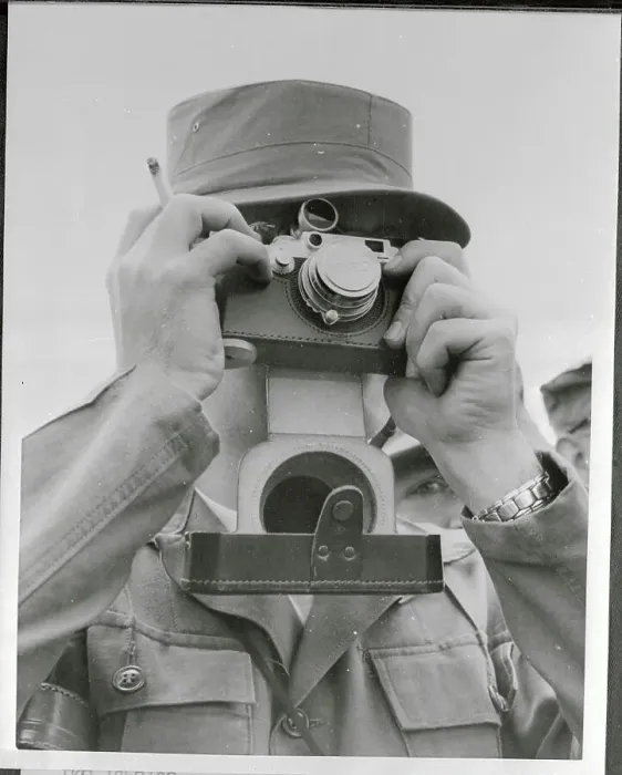 Framed Print : Man Taking Picture with Lens Cap Framed Print : Man Taking Picture with Lens Cap