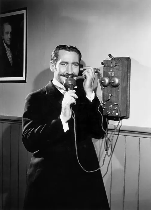 Framed Print : Man Talking On Duel-Transmitter Phone Framed Print : Man Talking On Duel-Transmitter Phone
