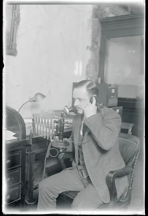 Framed Print : Man Talking on Telephone Framed Print : Man Talking on Telephone