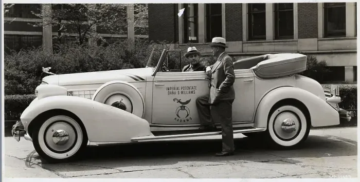 Framed Print : Man Talks To Driver Of 1935 Cadillac