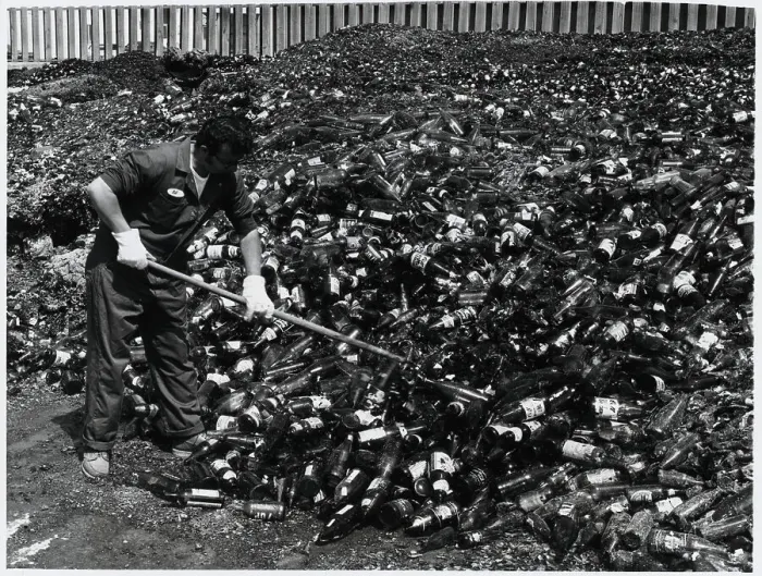 Framed Print : Man Tending Pile of Glass at Reclamation Framed Print : Man Tending Pile of Glass at Reclamation