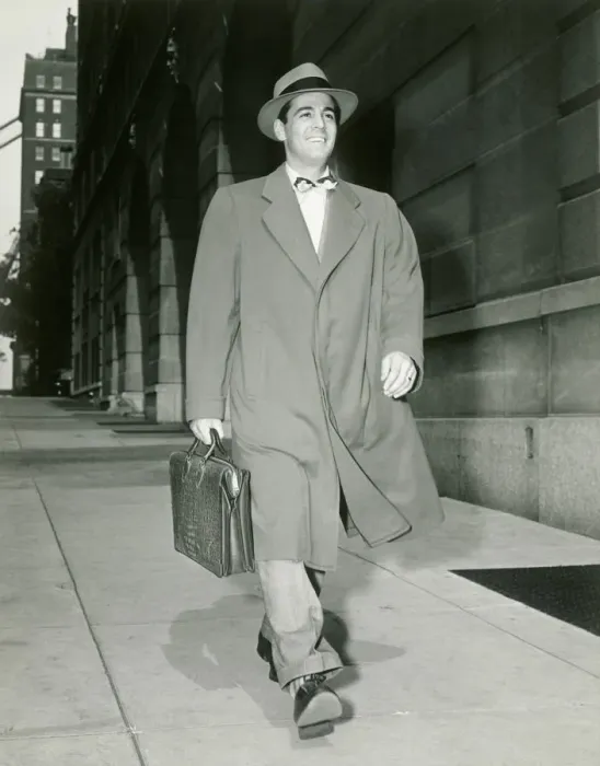 Framed Print : Man walking along sidewalk Framed Print : Man walking along sidewalk