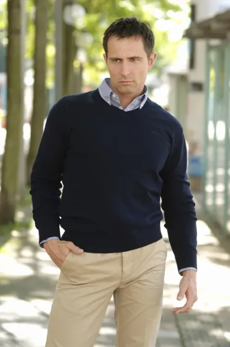 Framed Print : Man wearing casual clothes standing in an avenue