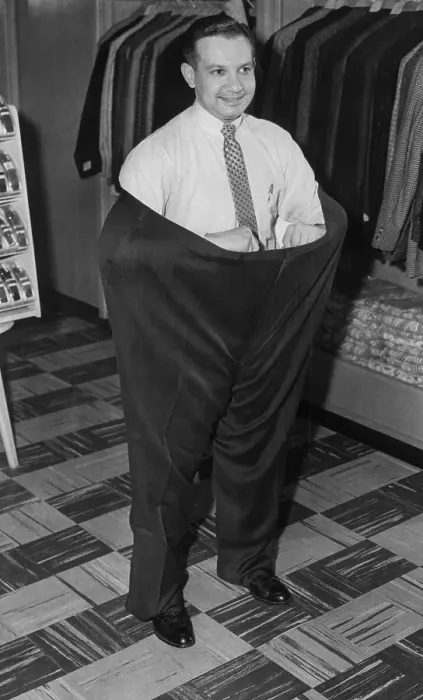 Framed Print : Man Wearing Extremely Large Slacks Framed Print : Man Wearing Extremely Large Slacks