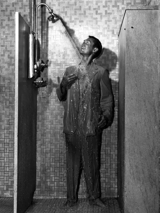 Framed Print : Man Wearing Suit While Showering Framed Print : Man Wearing Suit While Showering