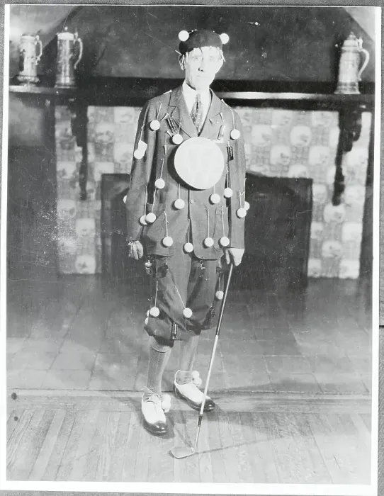 Framed Print : Man Wearing Unusual Costume With Golf Club Framed Print : Man Wearing Unusual Costume With Golf Club