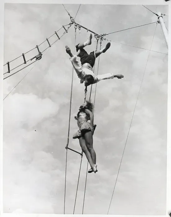 Framed Print : Man And Woman Doing High Wire Act