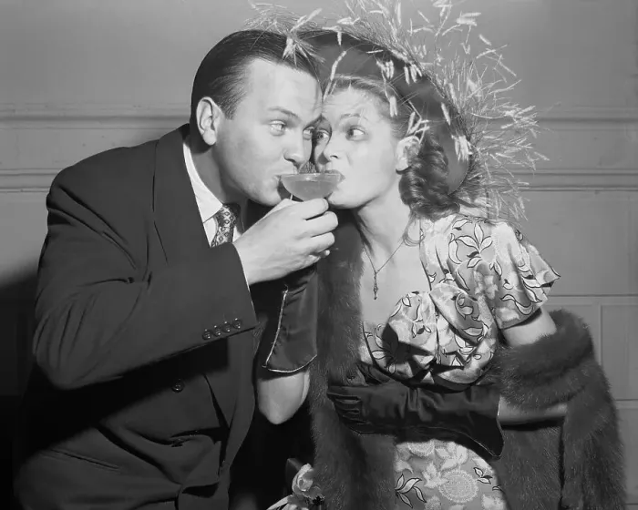 Framed Print : Man, Woman Drink Champagne From One Glass Framed Print : Man, Woman Drink Champagne From One Glass