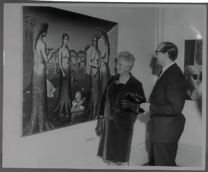 Framed Print : Man, Woman Looking At Painting Framed Print : Man, Woman Looking At Painting