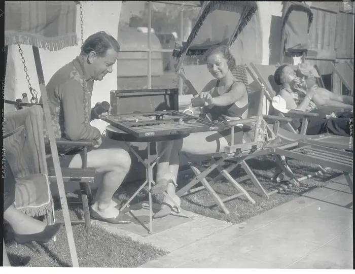 Framed Print : Man and Woman Playing Backgammon Framed Print : Man and Woman Playing Backgammon