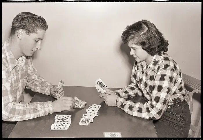 Framed Print : Man and Woman Playing Cards Framed Print : Man and Woman Playing Cards