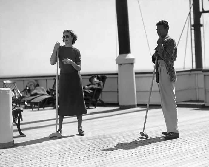 Framed Print : Man and Woman Playing Shuffleboard on a Ship Framed Print : Man and Woman Playing Shuffleboard on a Ship