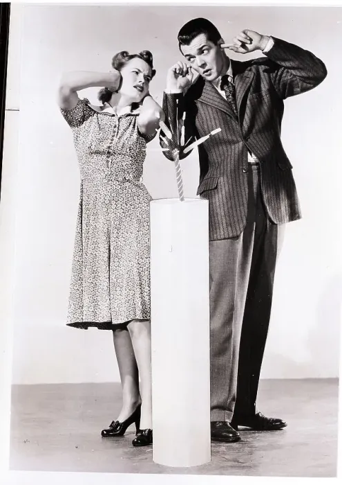 Framed Print : Man and Woman Pose with Giant Firecracker Framed Print : Man and Woman Pose with Giant Firecracker