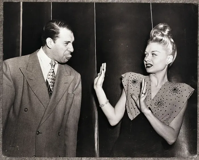 Framed Print : Man And Woman Pose As They Make Faces Framed Print : Man And Woman Pose As They Make Faces