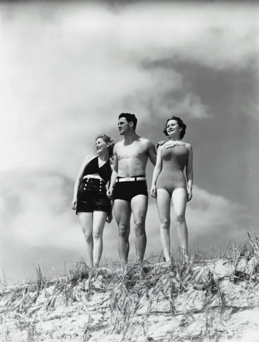 Framed Print : Man and two women standing on beach sand dune Framed Print : Man and two women standing on beach sand dune