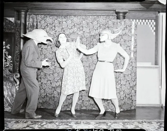 Framed Print : Man and Two Women Wearing W.T. Benda Masks Framed Print : Man and Two Women Wearing W.T. Benda Masks