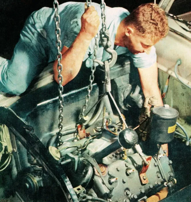 Framed Print : Man working on a car Framed Print : Man working on a car