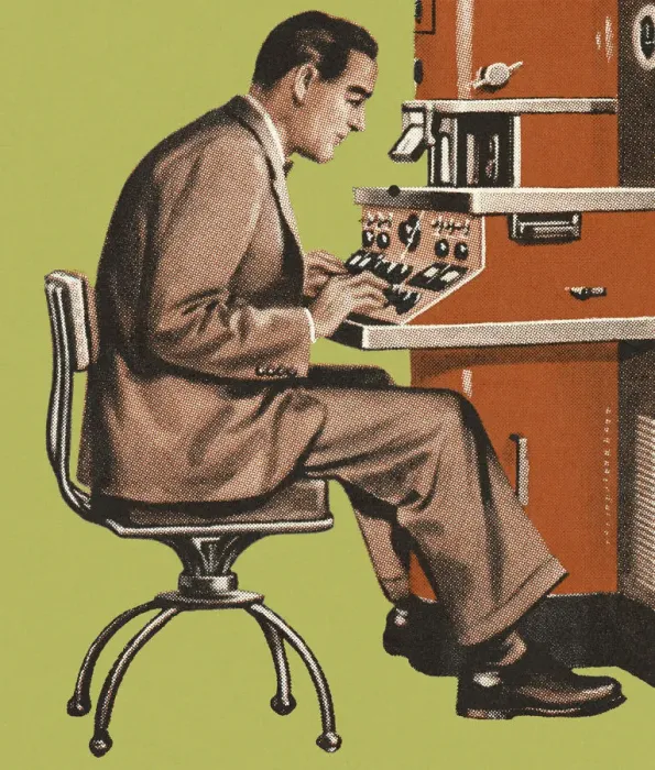 Framed Print : Man Working at a Control Panel