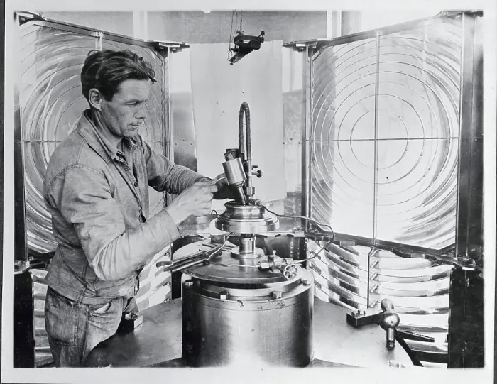 Framed Print : Man Working in Lighthouse Framed Print : Man Working in Lighthouse