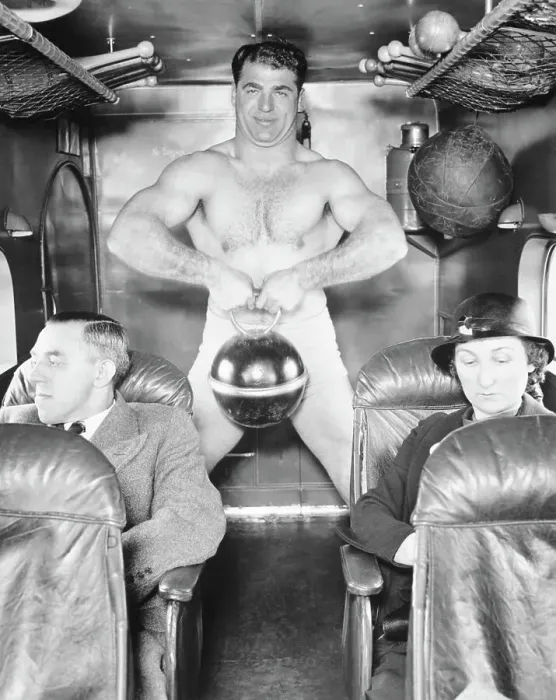 Framed Print : Man Working Out in a Plane