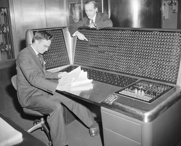 Framed Print : Man Works with Super Calculator to Split the Atom Framed Print : Man Works with Super Calculator to Split the Atom