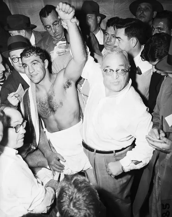 Framed Print : Manager Raising Rocky Marciano's Arm