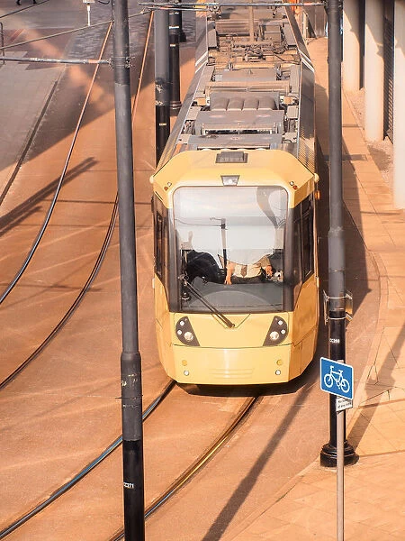 Manchester, yellow tram at Piccadilly