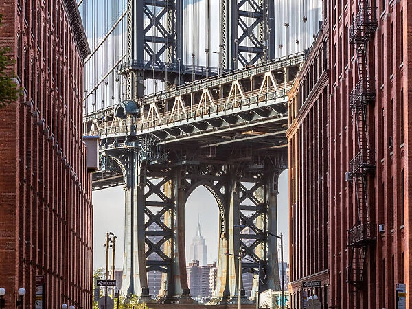 Manhattan bridge structure framing the Empire State building