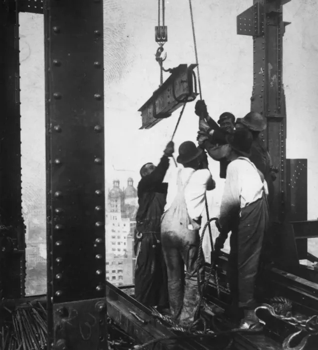 Framed Print : Manpower. circa 1930: A group of men hauling a girder up into a skyscraper Framed Print : Manpower. circa 1930: A group of men hauling a girder up into a skyscraper