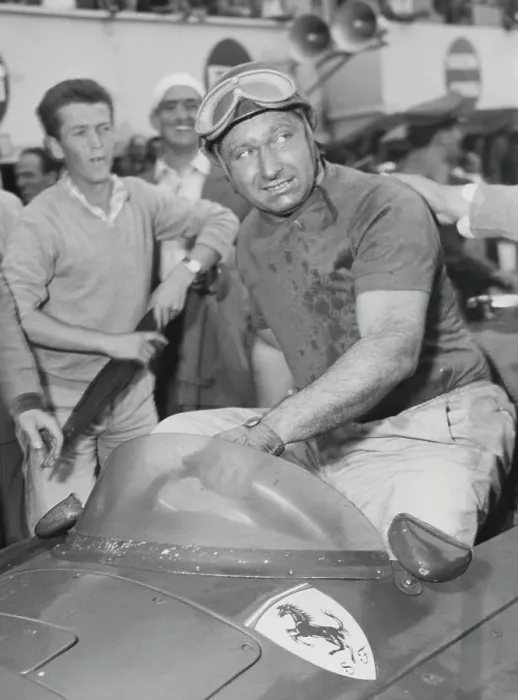 Framed Print : Manuel Fangio Climbing Out of His Car Framed Print : Manuel Fangio Climbing Out of His Car