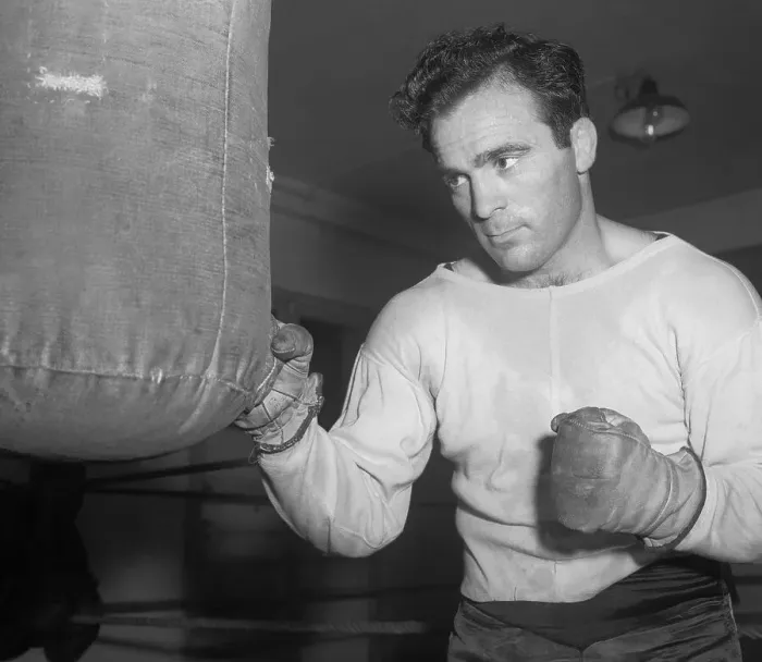 Framed Print : Marcel Cerdan Hitting a Punching Bag Framed Print : Marcel Cerdan Hitting a Punching Bag
