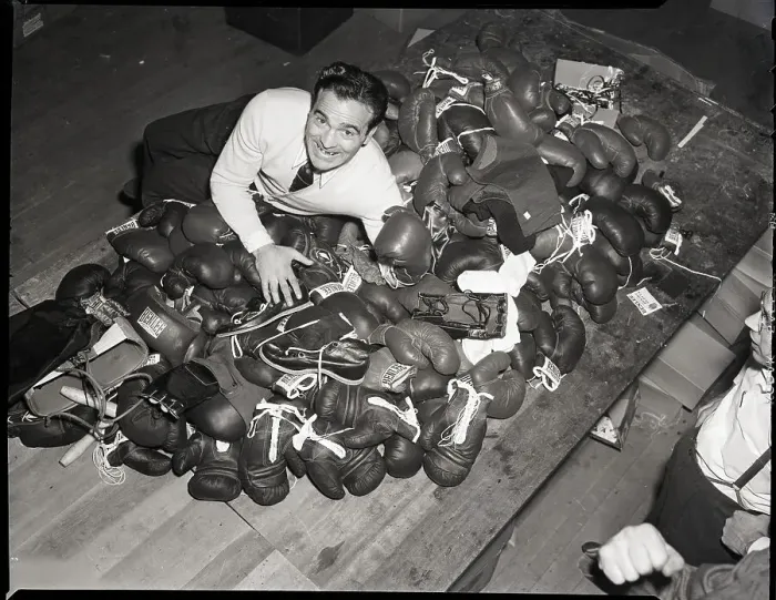 Framed Print : Marcel Cerdan Surrounded by Boxing Gloves Framed Print : Marcel Cerdan Surrounded by Boxing Gloves