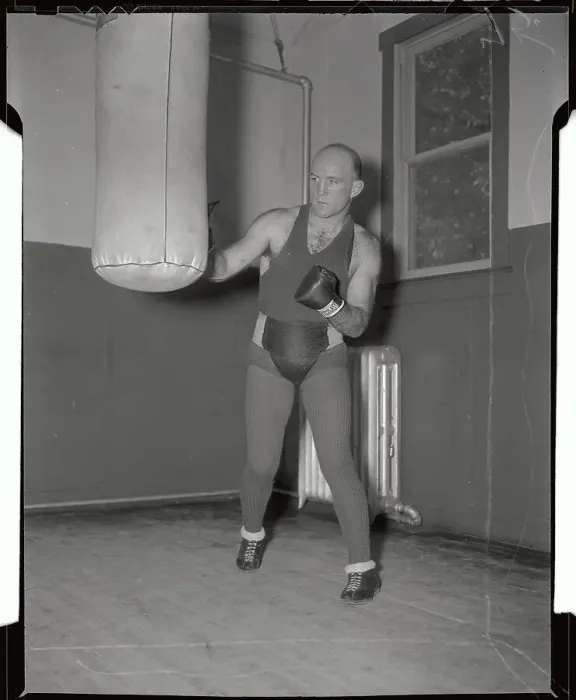 Framed Print : Marcel Thil Hitting Punching Bag Framed Print : Marcel Thil Hitting Punching Bag