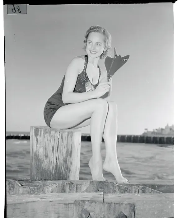 Framed Print : Marcia Valibus Posing with Model of Navy Cougar Plane Framed Print : Marcia Valibus Posing with Model of Navy Cougar Plane