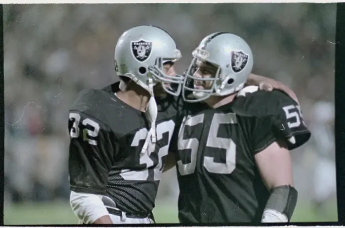 Framed Print : Marcus Allen Embracing Teammate Framed Print : Marcus Allen Embracing Teammate