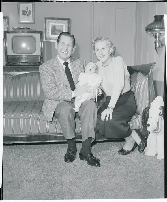 Framed Print : Margaret Whiting and Lou Bush Holding Their Baby Girl Framed Print : Margaret Whiting and Lou Bush Holding Their Baby Girl