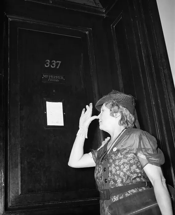 Framed Print : Marie Randby Thumbs Nose at Senator's Door