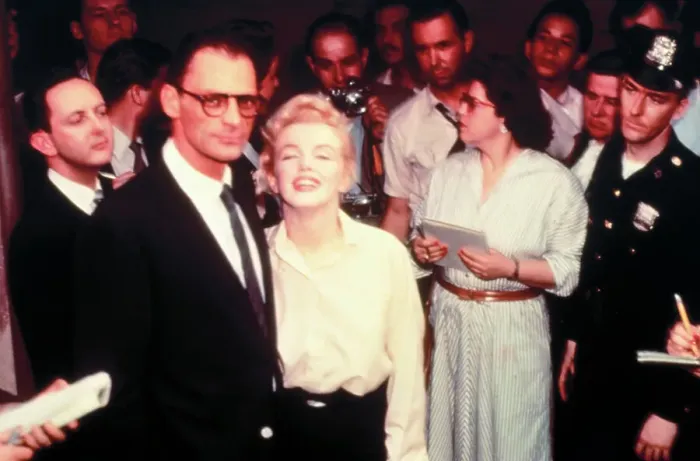 Framed Print : Marilyn Monroe and Arthur Miller Posing in Front of Press Group Framed Print : Marilyn Monroe and Arthur Miller Posing in Front of Press Group
