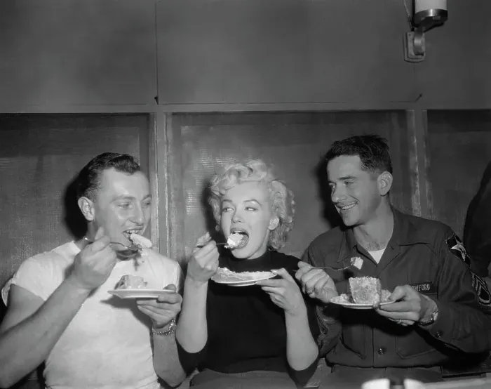 Framed Print : Marilyn Monroe Eating Cake Framed Print : Marilyn Monroe Eating Cake