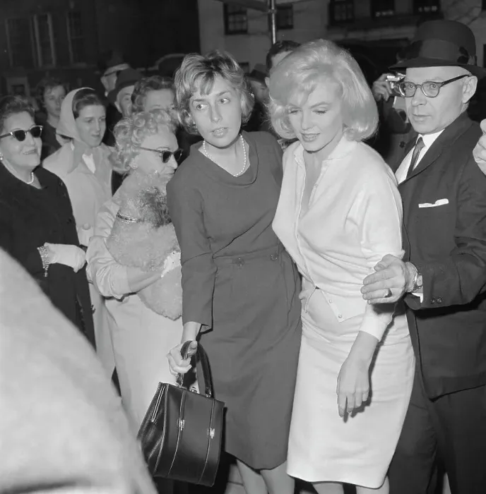 Framed Print : Marilyn Monroe Being Escorted from Hospital Framed Print : Marilyn Monroe Being Escorted from Hospital