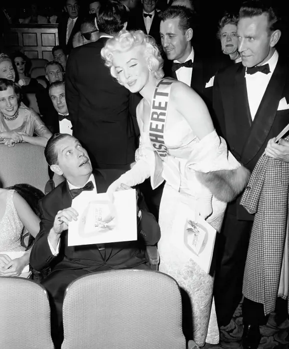 Framed Print : Marilyn Monroe Gives Milton Berle a Program Framed Print : Marilyn Monroe Gives Milton Berle a Program