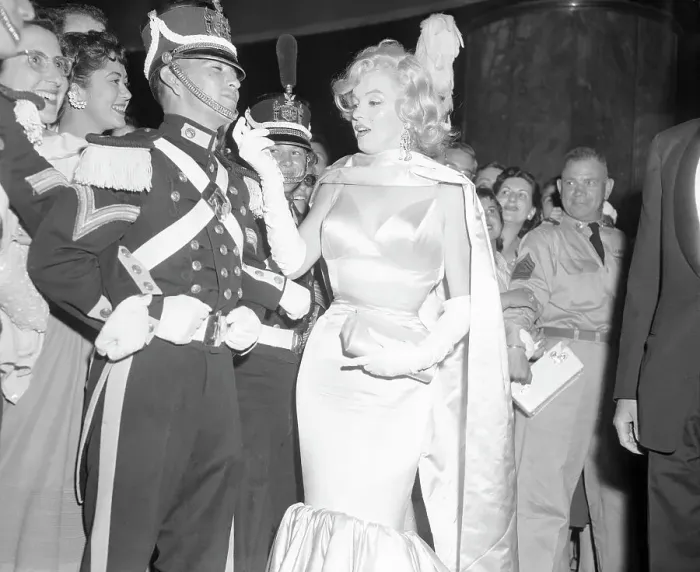 Framed Print : Marilyn Monroe Greeting Soldier in Elaborate Guard Uniform Framed Print : Marilyn Monroe Greeting Soldier in Elaborate Guard Uniform