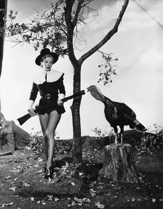 Framed Print : Marilyn Monroe Posing with a Turkey