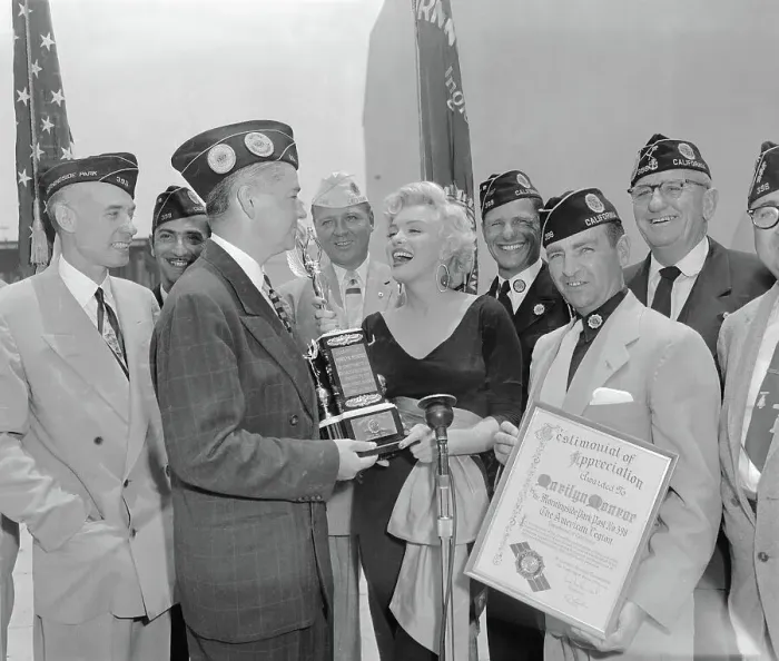 Framed Print : Marilyn Monroe Receiving a Trophy Framed Print : Marilyn Monroe Receiving a Trophy