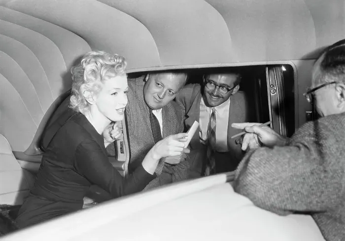 Framed Print : Marilyn Monroe Talking with Reporters from Inside Limousine Framed Print : Marilyn Monroe Talking with Reporters from Inside Limousine