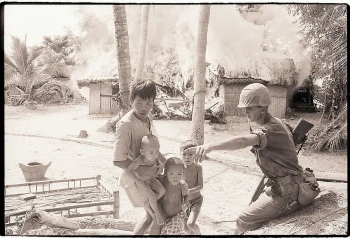 Framed Print : Marine Directs Viet Cong People from Burning Home Framed Print : Marine Directs Viet Cong People from Burning Home