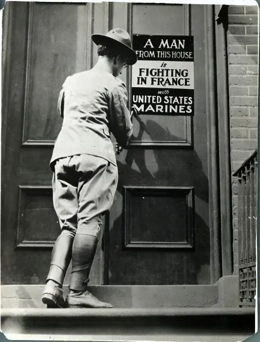 Framed Print : Marine Placing A Information Placeard Framed Print : Marine Placing A Information Placeard