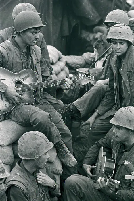 Framed Print : Marine Soldier Playing Guitar to Buddies Framed Print : Marine Soldier Playing Guitar to Buddies