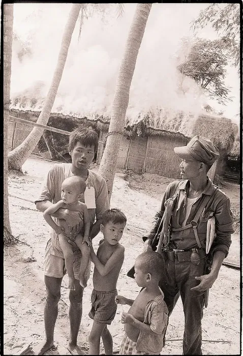 Framed Print : Marine with Viet Cong Man and Family Framed Print : Marine with Viet Cong Man and Family