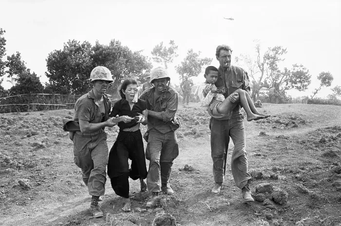 Framed Print : Marines Help Wounded Vietnamese